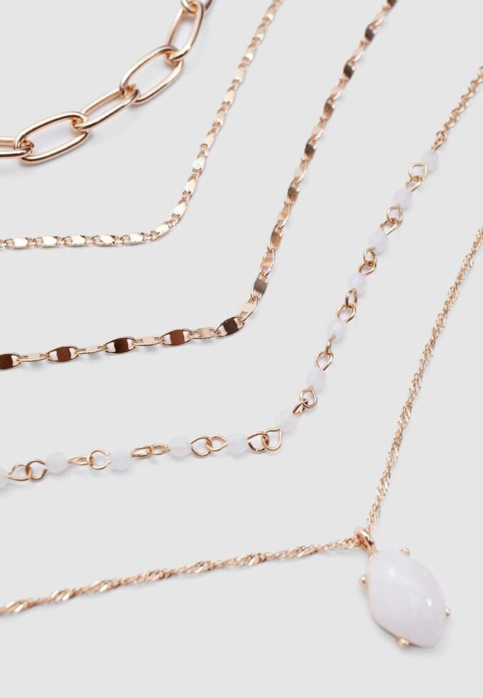 Set med 5 halsband med rosa stenar