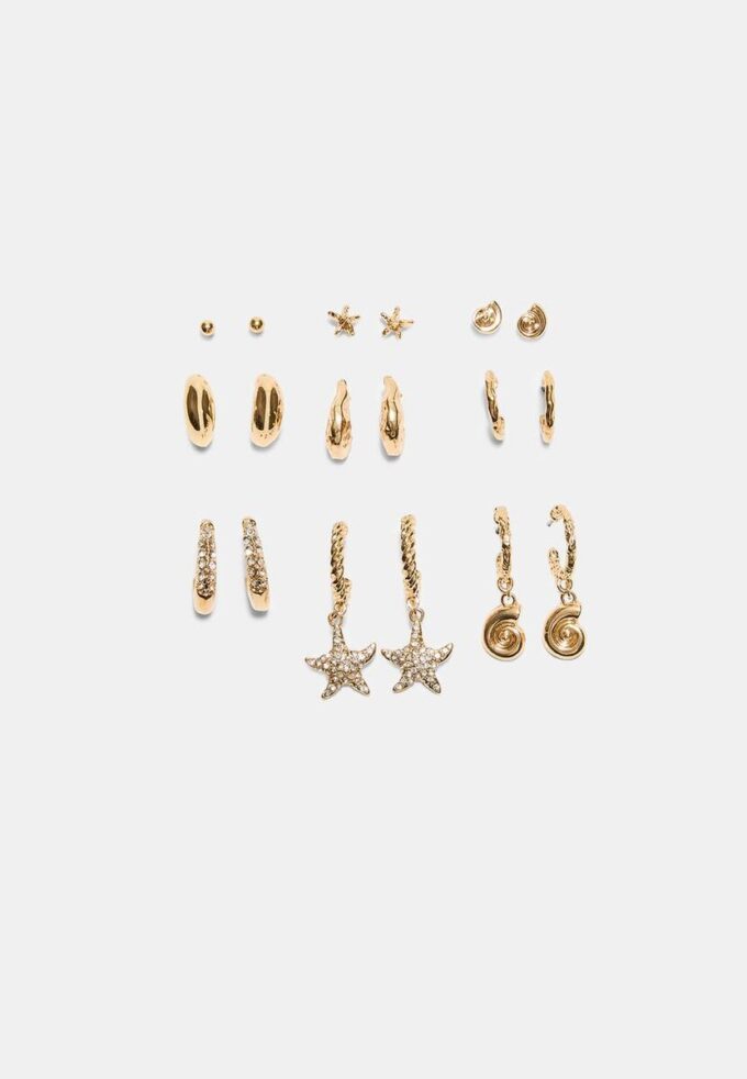 Set med 9 örhängen med strass och sjöstjärnor