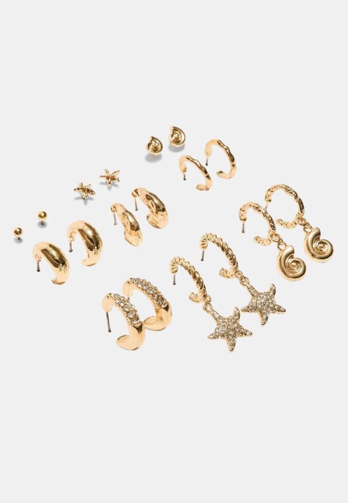Set med 9 örhängen med strass och sjöstjärnor