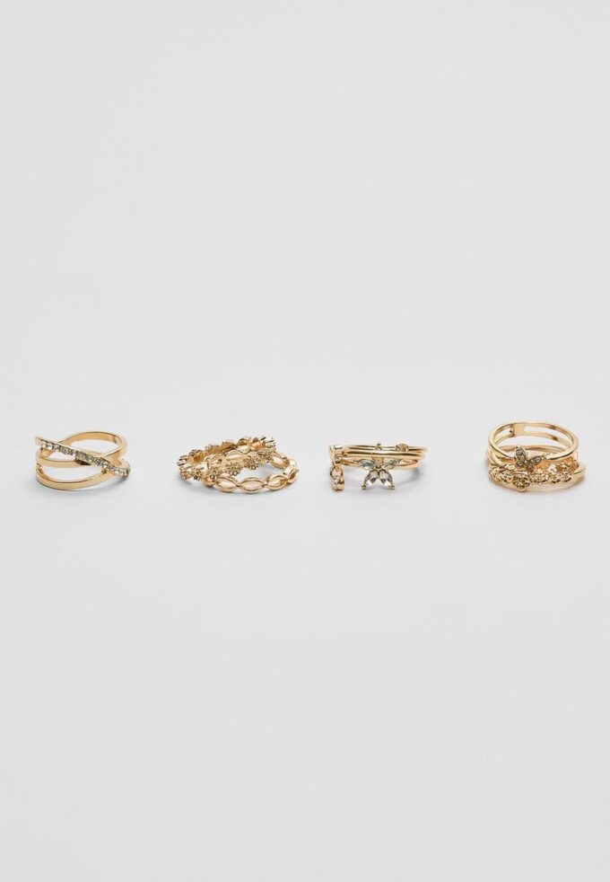 Set med 9 ringar med fjärilar och strass