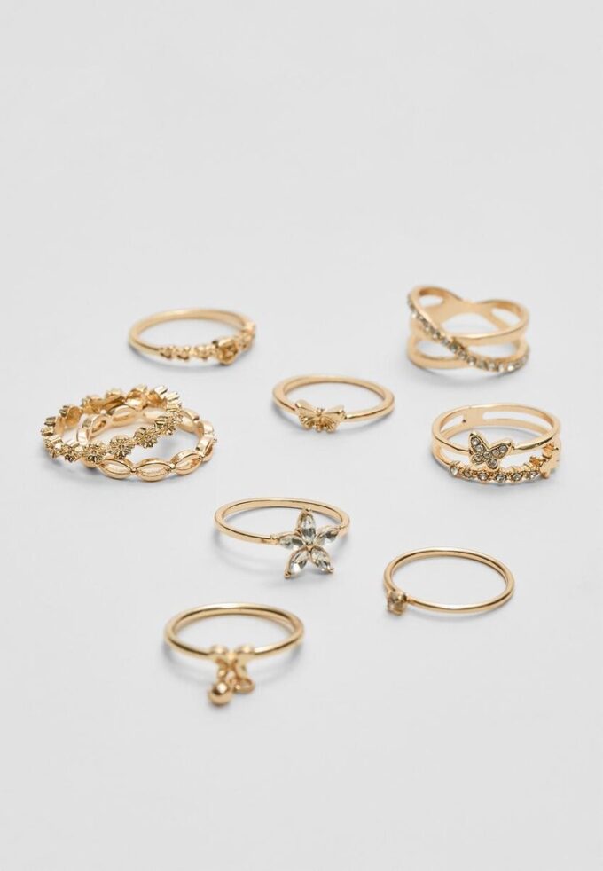 Set med 9 ringar med fjärilar och strass