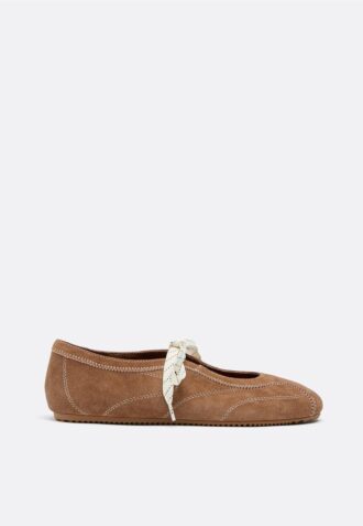 Skinnsneakers med rosett