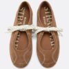 Skinnsneakers med rosett