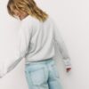 Soft Touch-basplagg med stickade detaljer