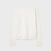 Soft Touch-basplagg med stickade detaljer