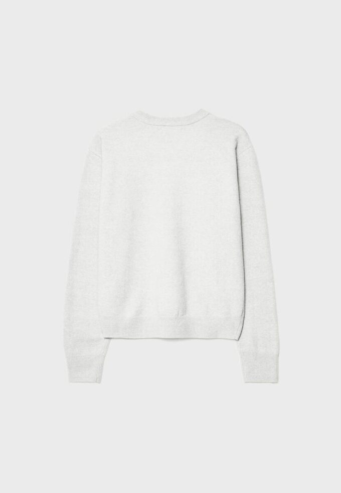 Soft Touch-basplagg med stickade detaljer