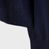 Soft Touch-basplagg med stickade detaljer