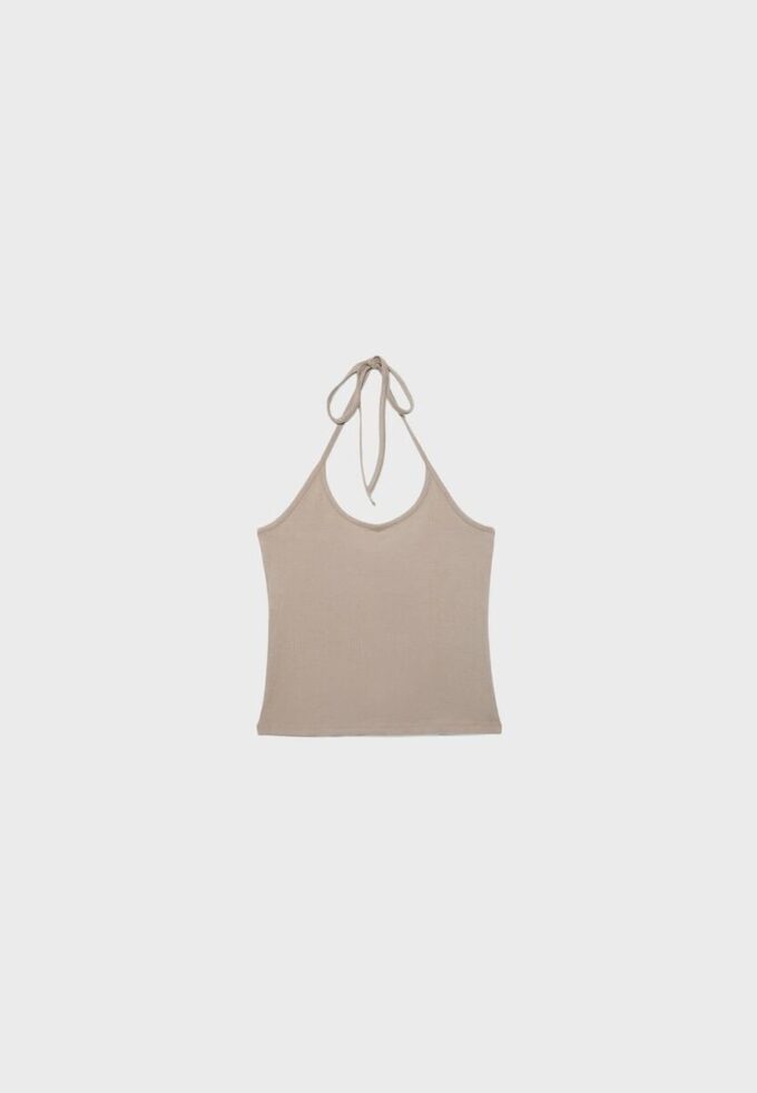 Stickad halterneck-toppar