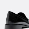Svarta loafers i skinnimitation
