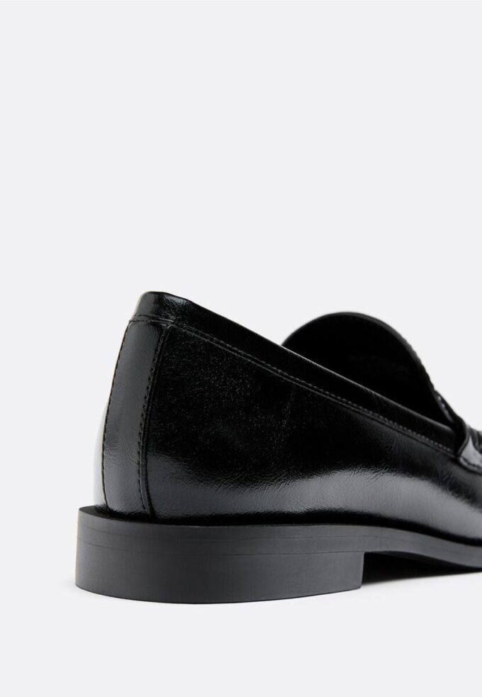 Svarta loafers i skinnimitation