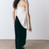 Toppar i satin med asymmetrisk fåll