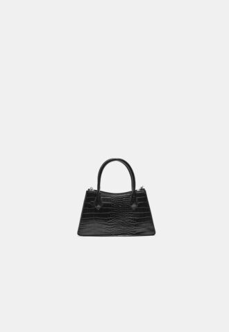 Trapezformad axelväska med kokosnötslook