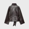 Trenchcoat med hög krage i skinnimitation Trenchcoat med hög krage i skinnimitation